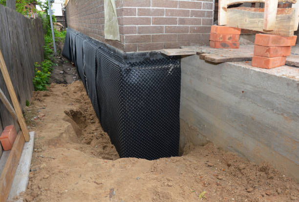 SJ Waterproofing Pros technician performing targeted Waterproofing assessment in Bridgeport, NJ